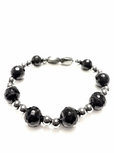 This phenomenal bracelet uses the healing properties of  black agate, hematite and magnetite stones in its unique design for best wellness.  Agate healing properties are beneficial for manifesting goals, seeing things through and providing soft and steady support. Thank you for visiting Art of Natural Health.