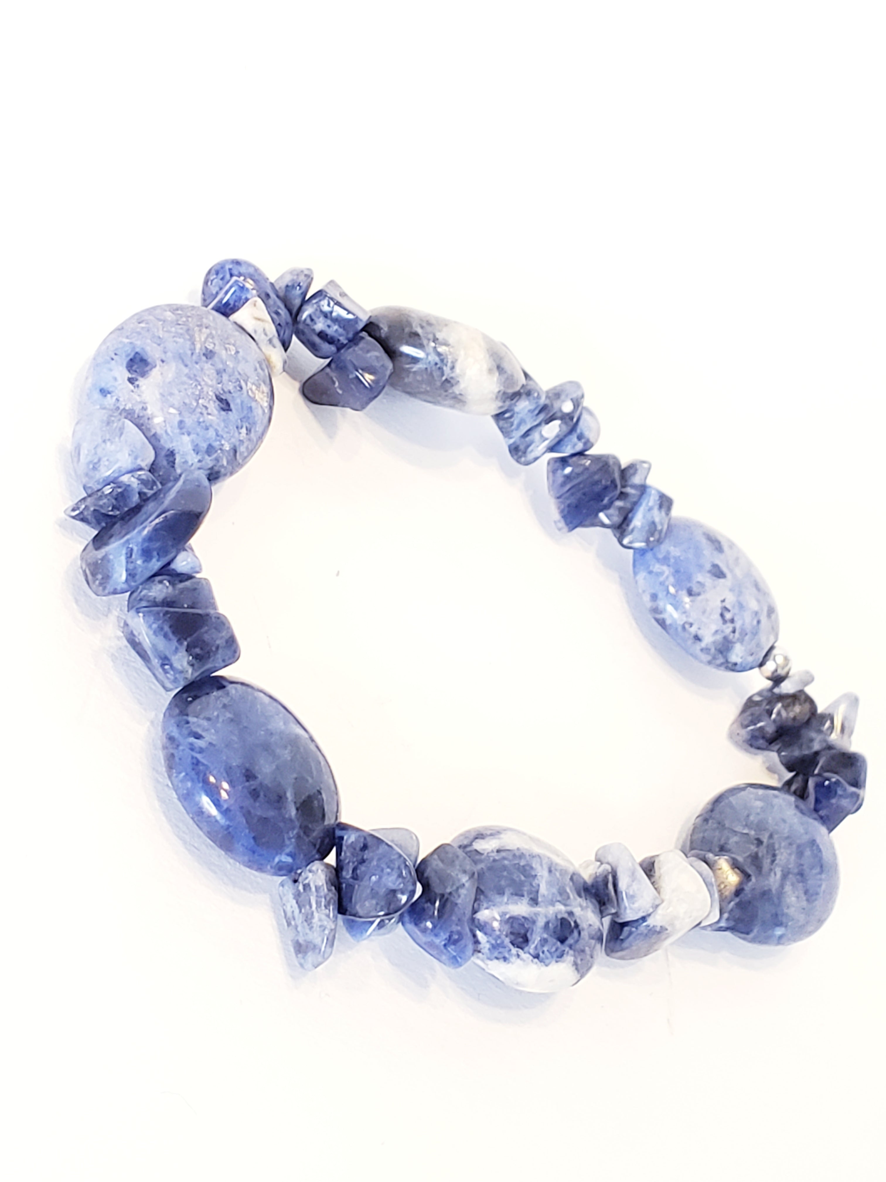 Beautiful stretch bracelet handcrafted with sodalite, a mineral stone that enhances self-esteem; calming and enhances emotional balance. Facilitates logical thinking; improves logical thinking and communication. Makes a beautiful gift for yourself or a loved one. Art of Natural Health, we aim to help you on your wellness journey!